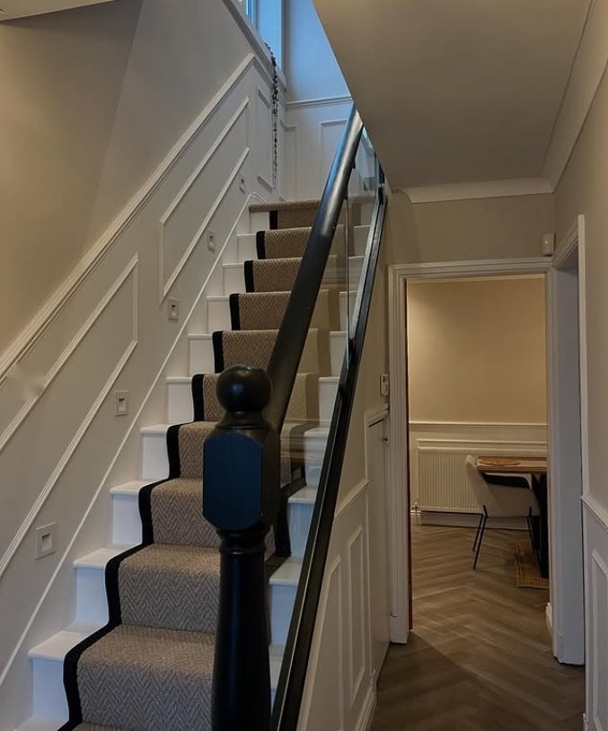 The same home's panelled staircase